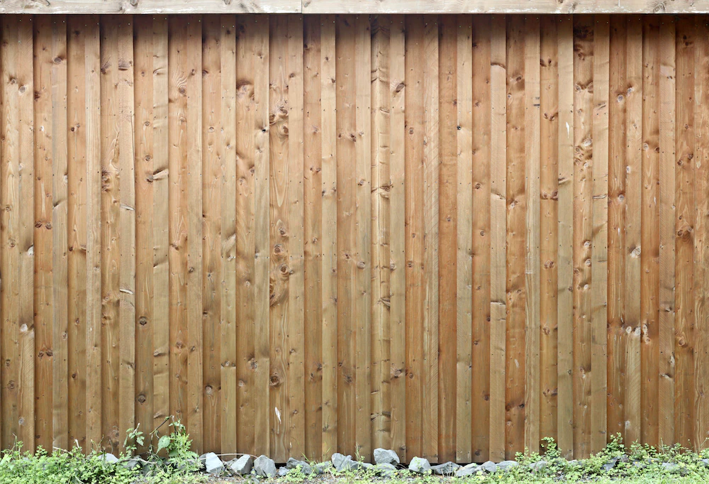 Read more about the article A Step-by-Step Guide: How to Install a Wood Fence like a Pro